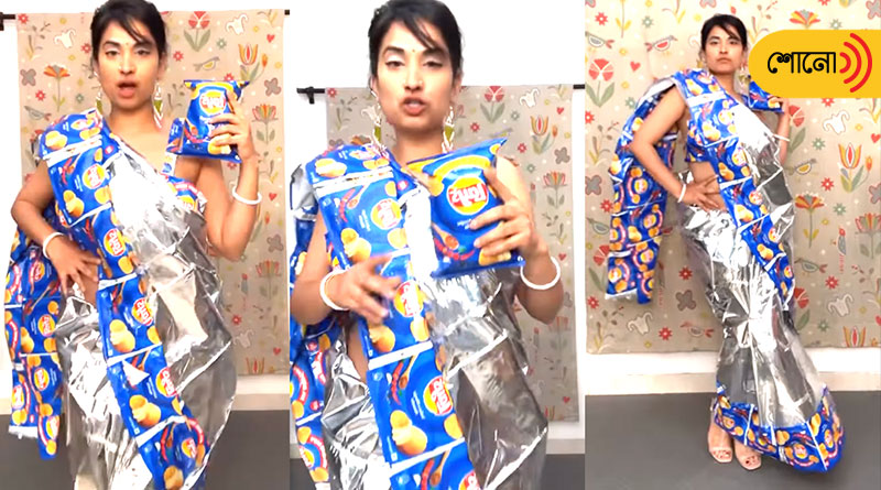 A girl wearing a saree made of chips wrappers