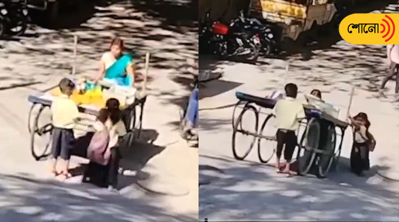 Woman struggles to push loaded fruit cart, school kids come to her aid