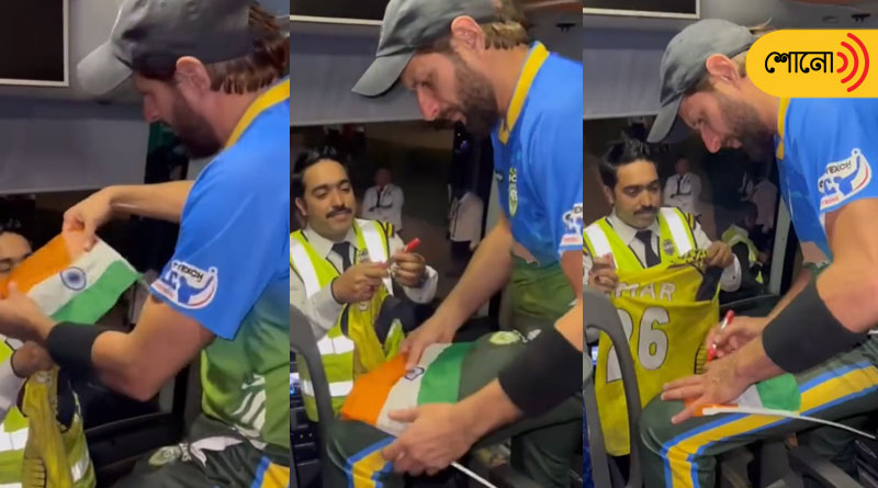 Shahid Afridi gives autograph to fan on Indian flag