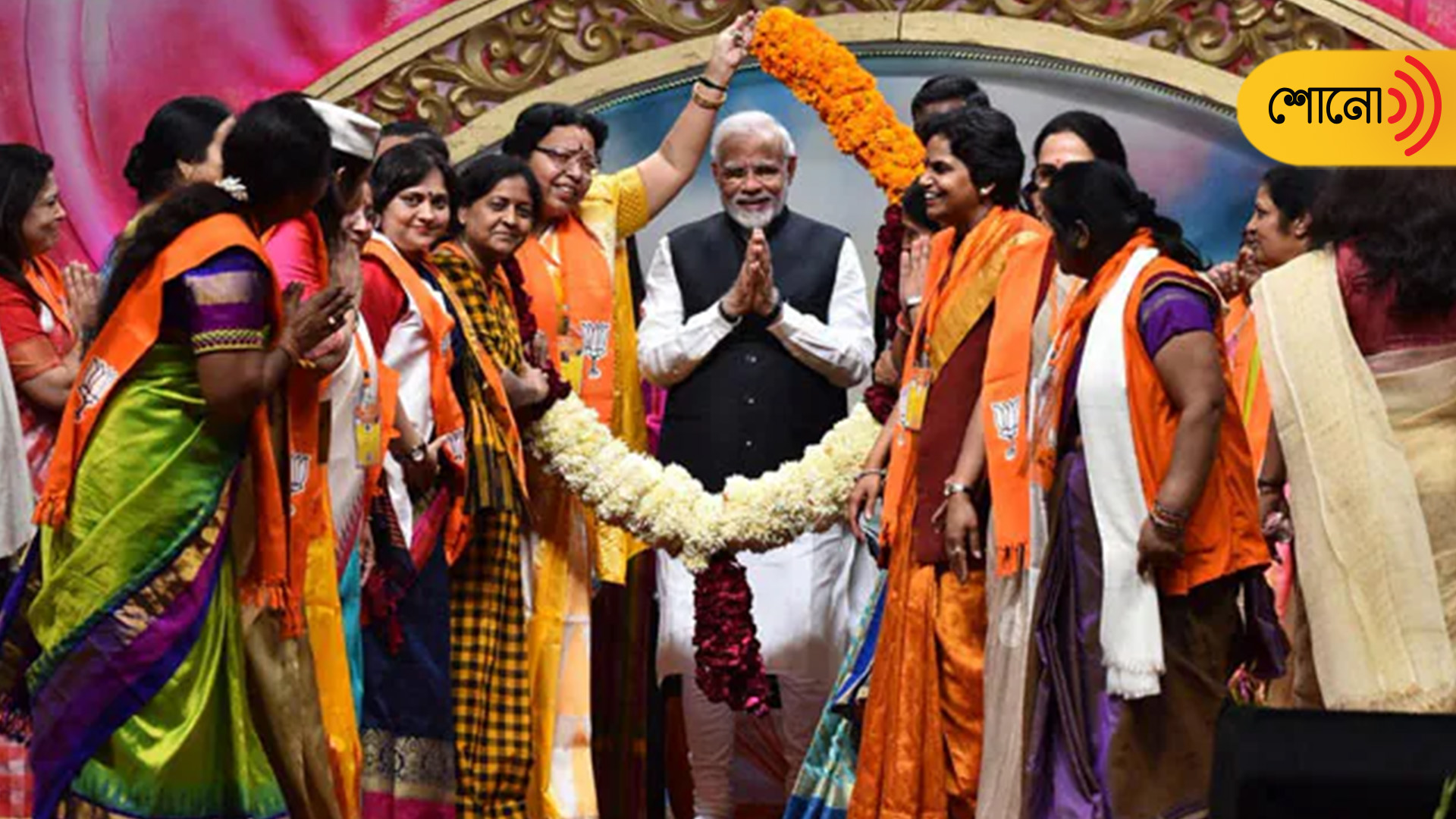 Modi Touches Feet Of BJP Women Cadres Who Felicitated Him For Reservation Bill